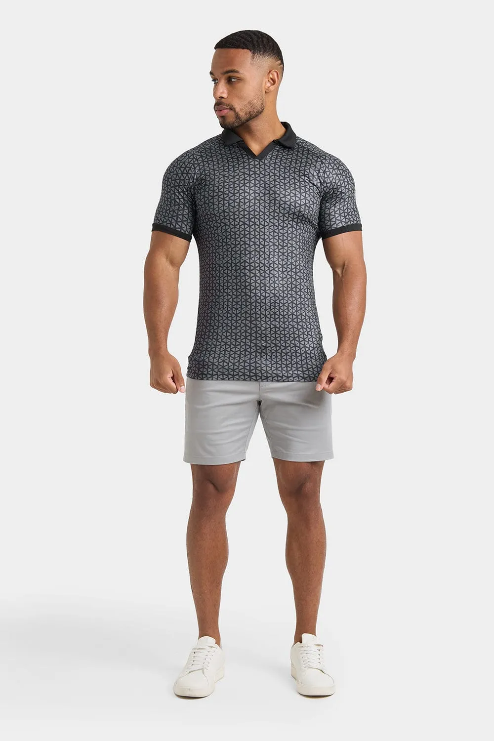 Printed Polo Shirt in Black Doodle Geo