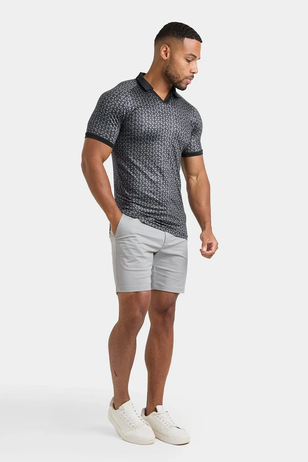 Printed Polo Shirt in Black Doodle Geo