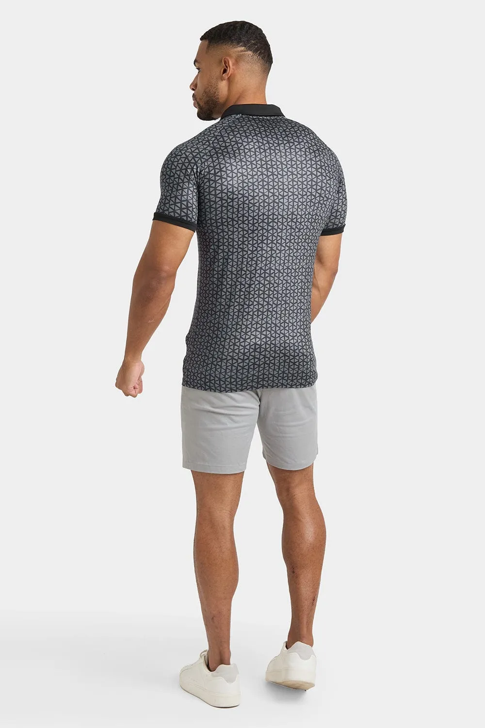 Printed Polo Shirt in Black Doodle Geo